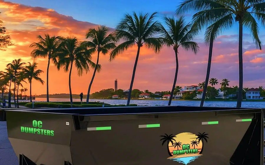 Black OC Dumpsters roll off dumpster at sunset